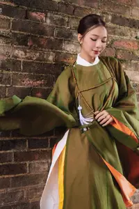 Timeless Vietnamese Charm: Elegant Girl in Traditional Attire and Nón Quai Thao - image 9