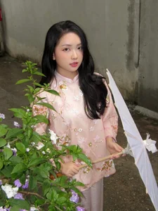 The Ultimate Beauty Poll: Which Vietnamese WAG Takes the Crown for Most Stunning Style and Grace? - image 5