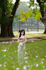 Elegant Young Woman's Gentle Beauty by Ancient Tracks: A Poetic Nature Portrait - image 2