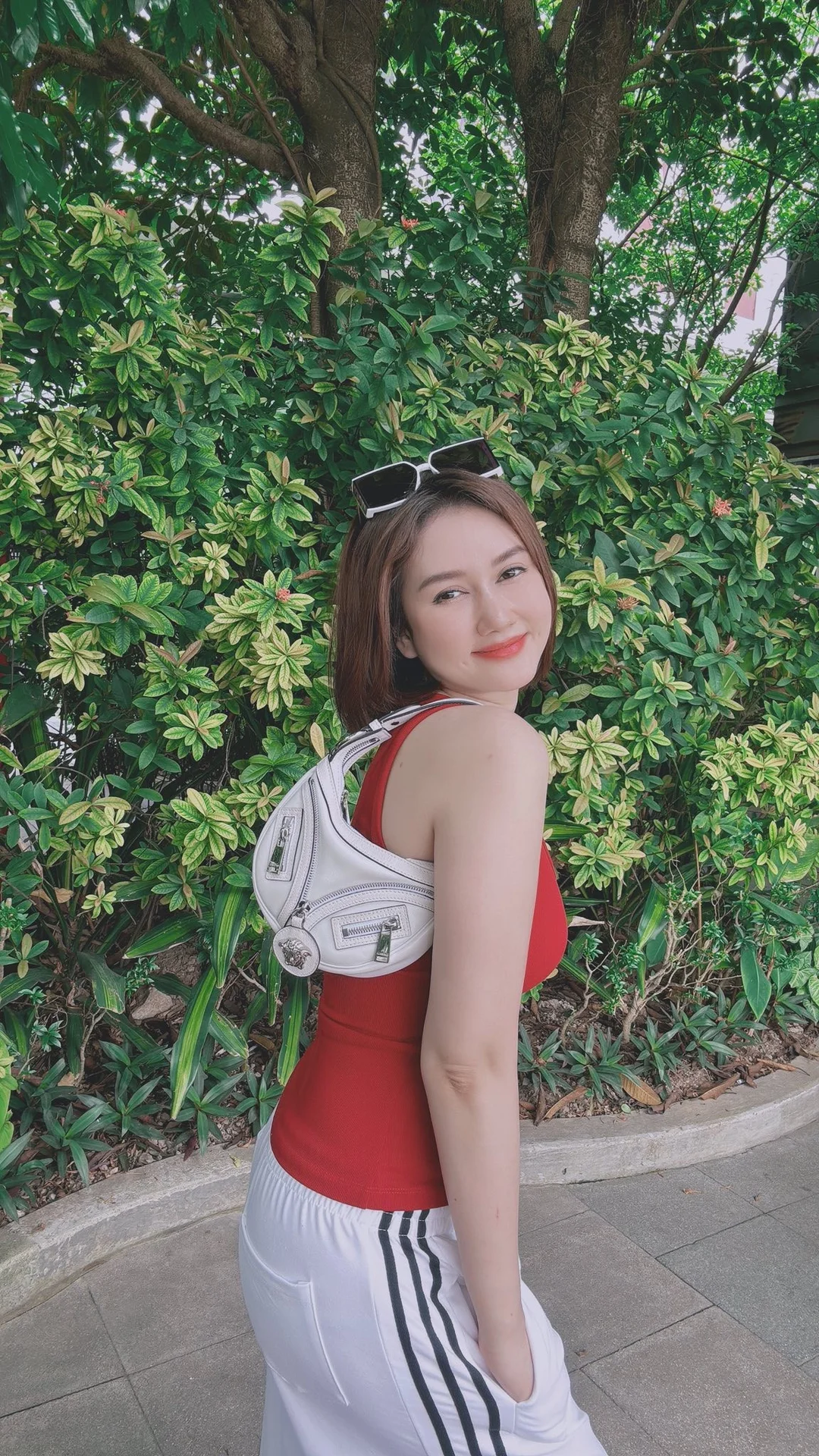 Angela Phuong Trinh Stuns Fans with Her Impressive Fitness Transformation and Muscular Physique