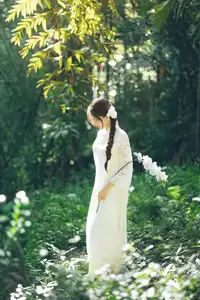Charming Young Woman in White Lace & Orchids: Radiant Natural Beauty Amidst Greenery 1000026906 - image 4
