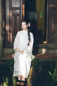 Charming Young Woman in White Lace & Orchids: Radiant Natural Beauty Amidst Greenery 1000026906 - image 13