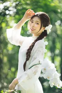 Charming Young Woman in White Lace & Orchids: Radiant Natural Beauty Amidst Greenery 1000026906 - image 6