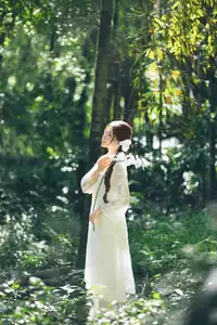 Charming Young Woman in White Lace & Orchids: Radiant Natural Beauty Amidst Greenery 1000026906 - image 9