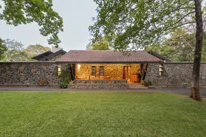 Eco-Friendly Basalt Stone House Hidden Within 5,000 Trees - image 3