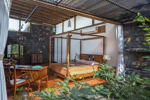 Eco-Friendly Basalt Stone House Hidden Within 5,000 Trees - image 9