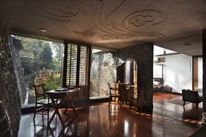 Eco-Friendly Basalt Stone House Hidden Within 5,000 Trees - image 6