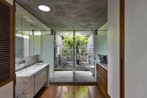 Eco-Friendly Basalt Stone House Hidden Within 5,000 Trees - image 7