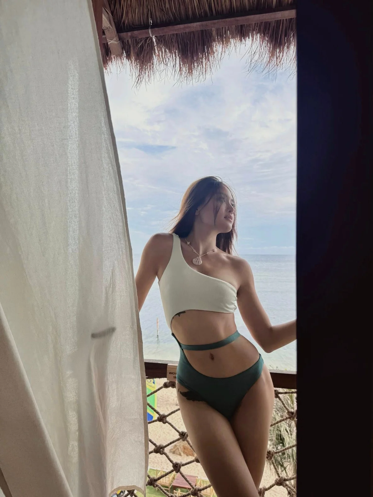 Thuy Anh Heats Up Summer: Stunning Bikini Photos and Her Unique Tattoos
